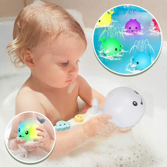 enfant jouant dans bain avec jouet de bain baleine blanche