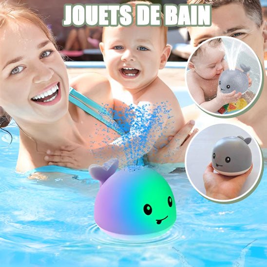 famille souriante dans piscine avec jouet de bain baleine jet