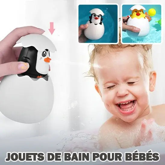bebe yeux fermer arroser visage par jouet de bain pingouin